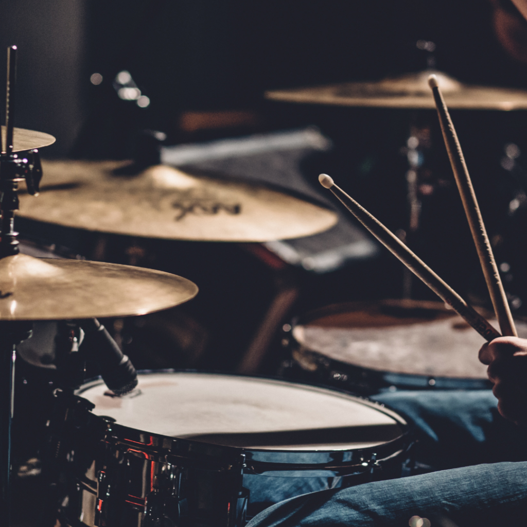 Man Playing the Drums