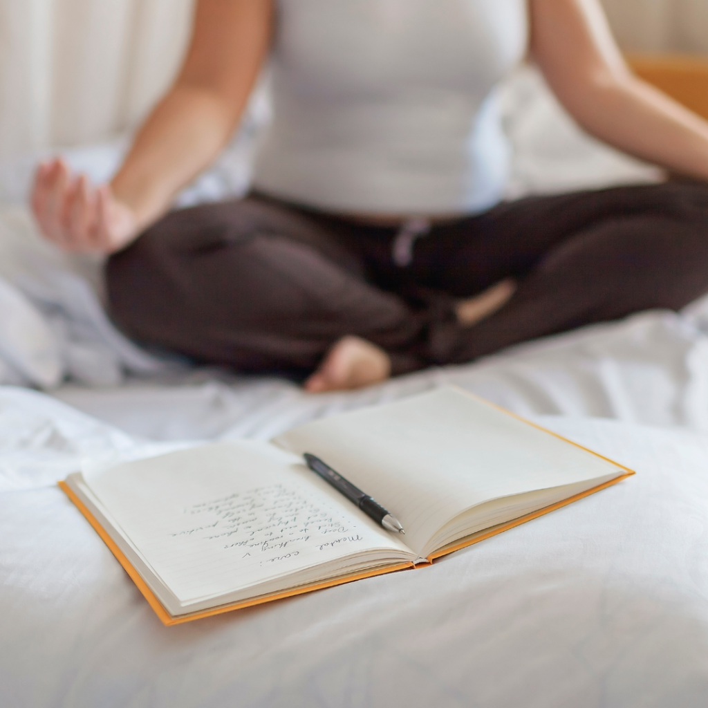 Woman Meditating in Bed Following Her Mental Care List