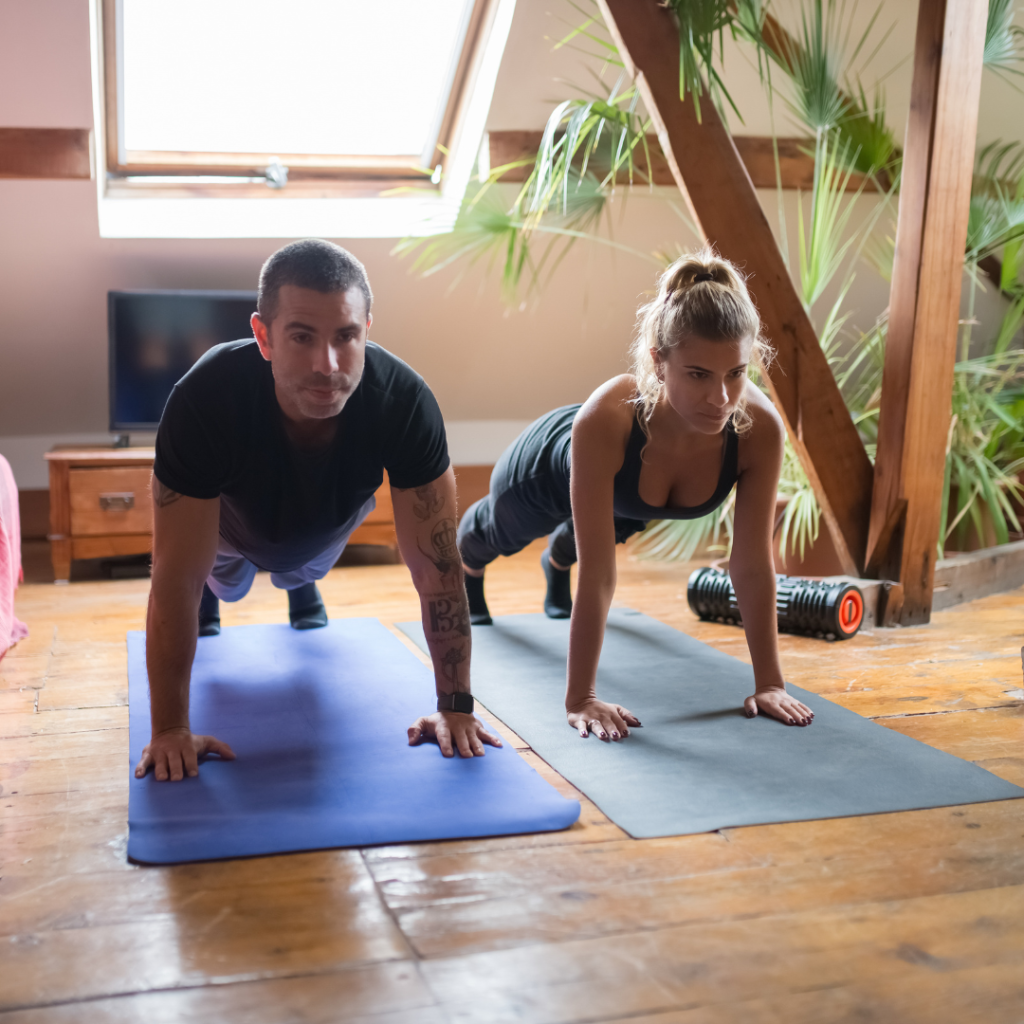 A Man and Woman Working Out Together