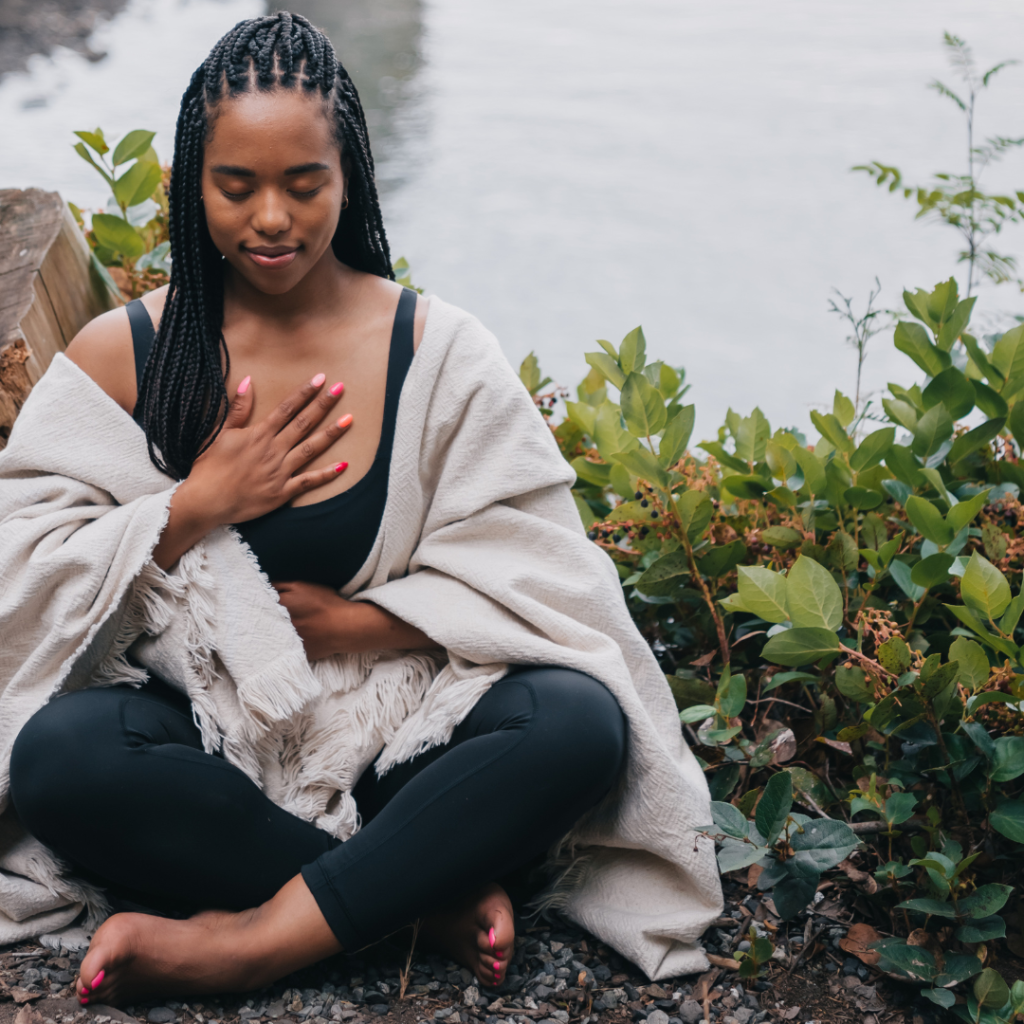 Close-Up Shot of a Woman Meditating