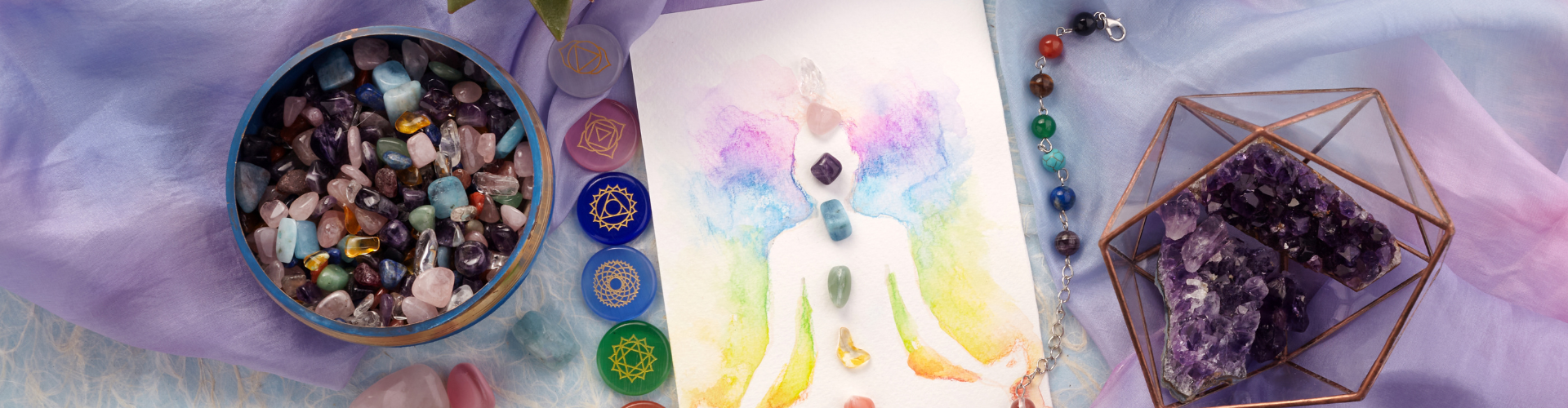 Natural crystals and pendulum on pastel silk background. Reiki background with card.