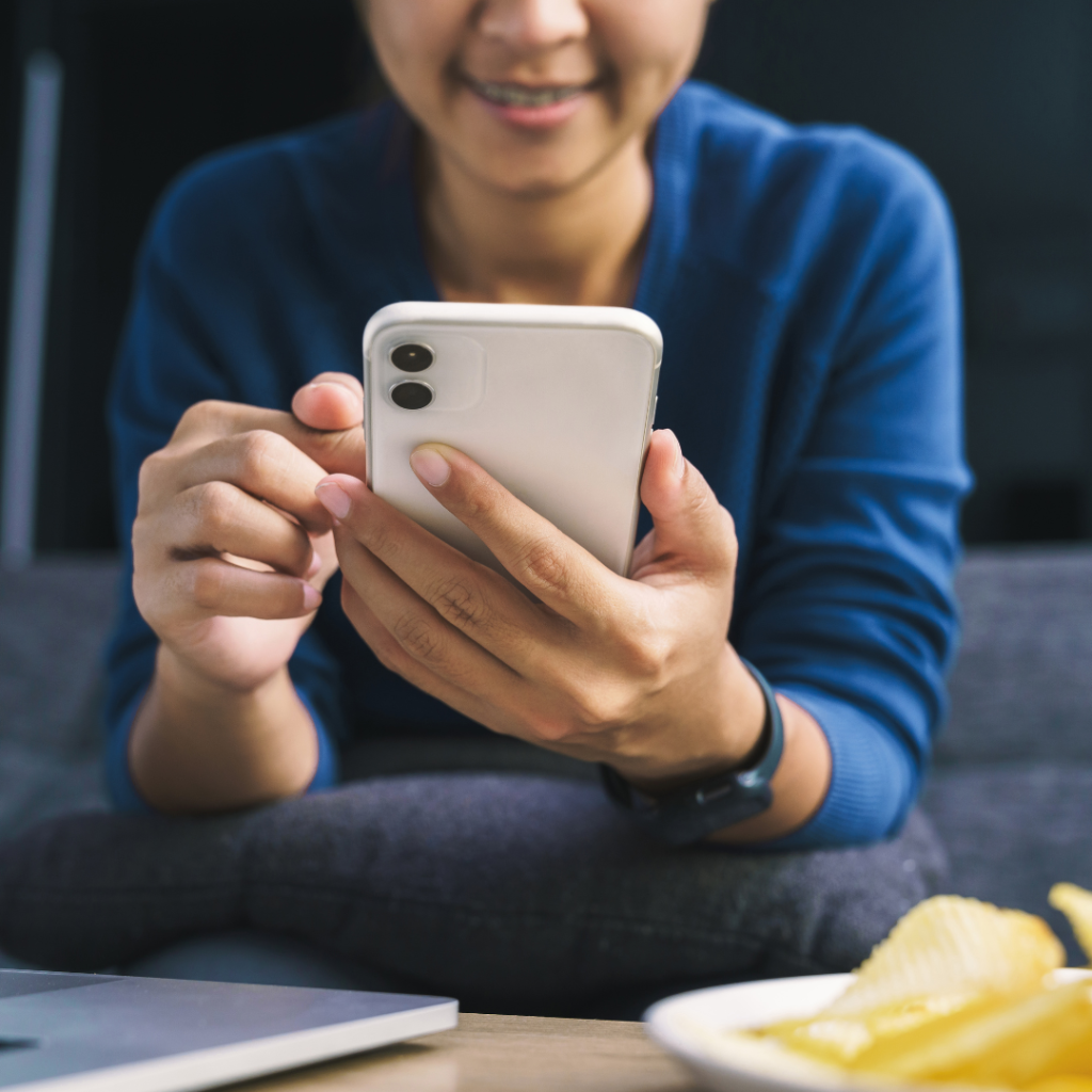 Person Using Mobile Phone