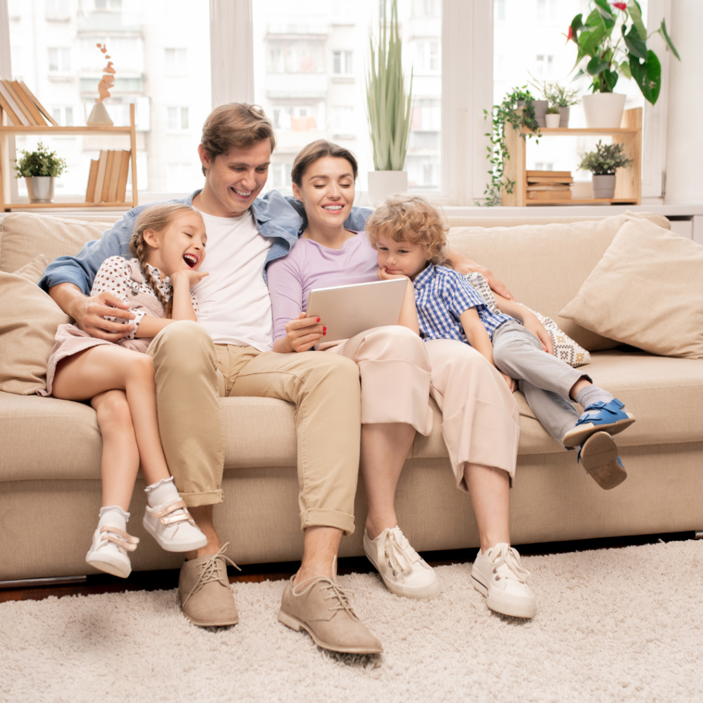 Family Relaxing on Couch in Living-Room