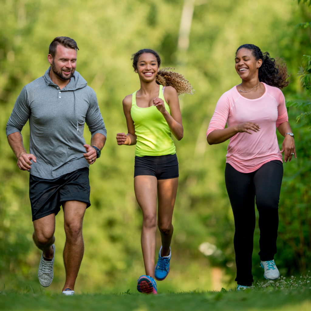 Family Happily Running Outside