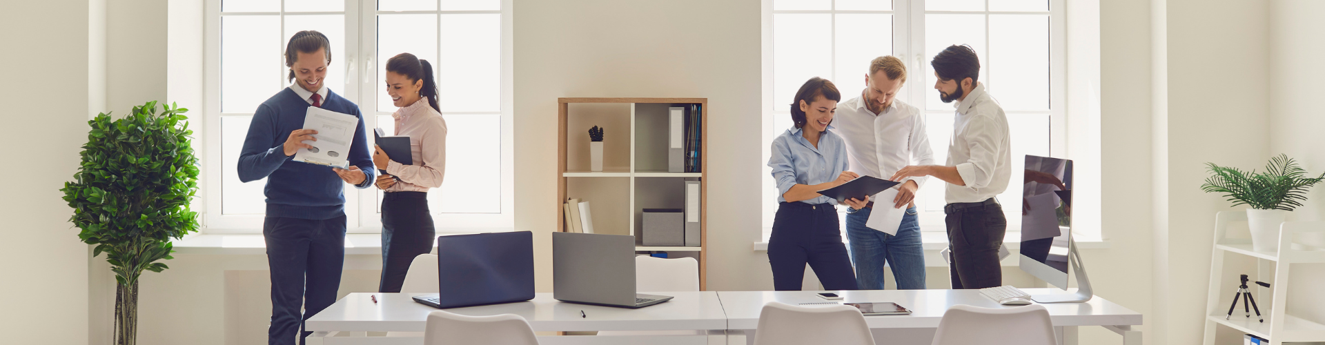 Happy Company Workers Meeting, Talking, Discussing Business Projects in Modern Office Workspace