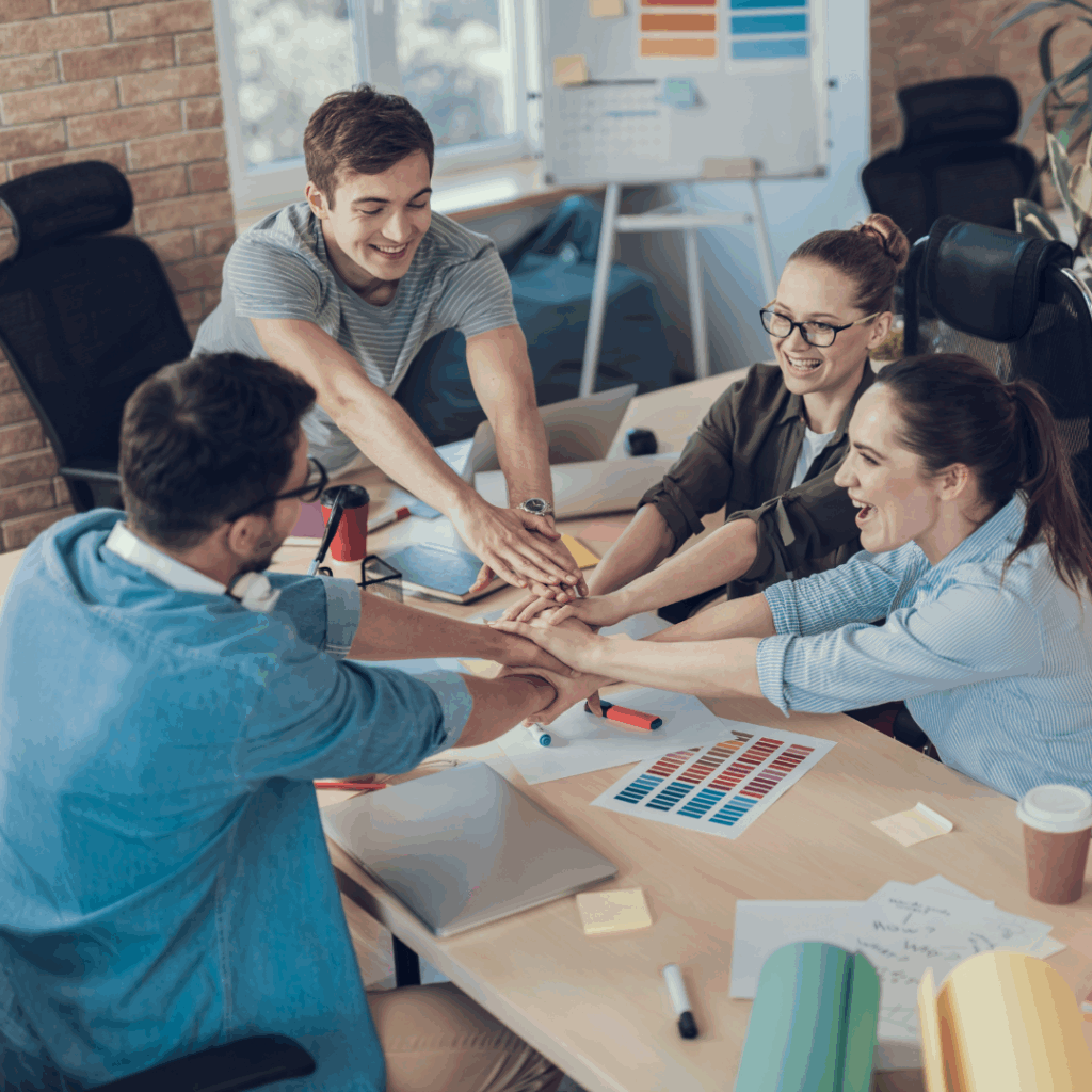 Happy employees with new project in office