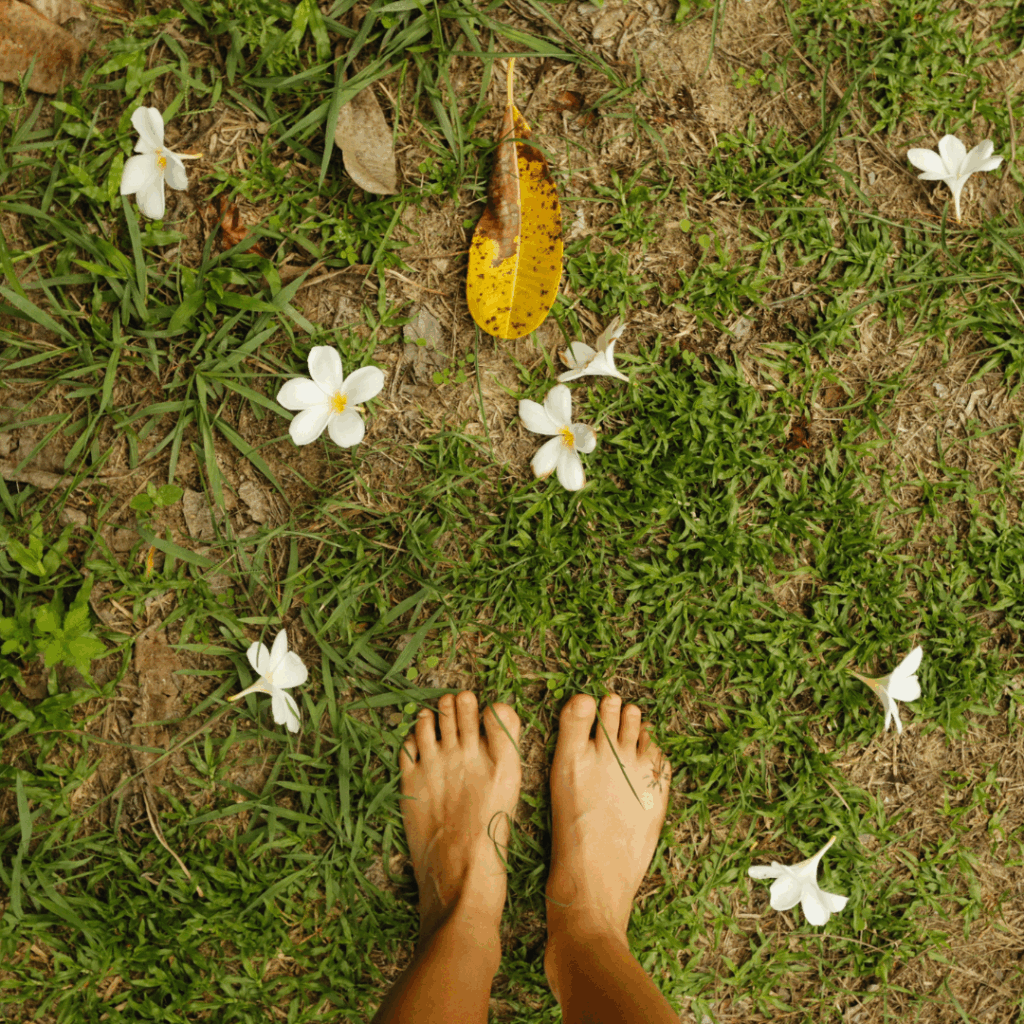 A Person Stepping on the Grass