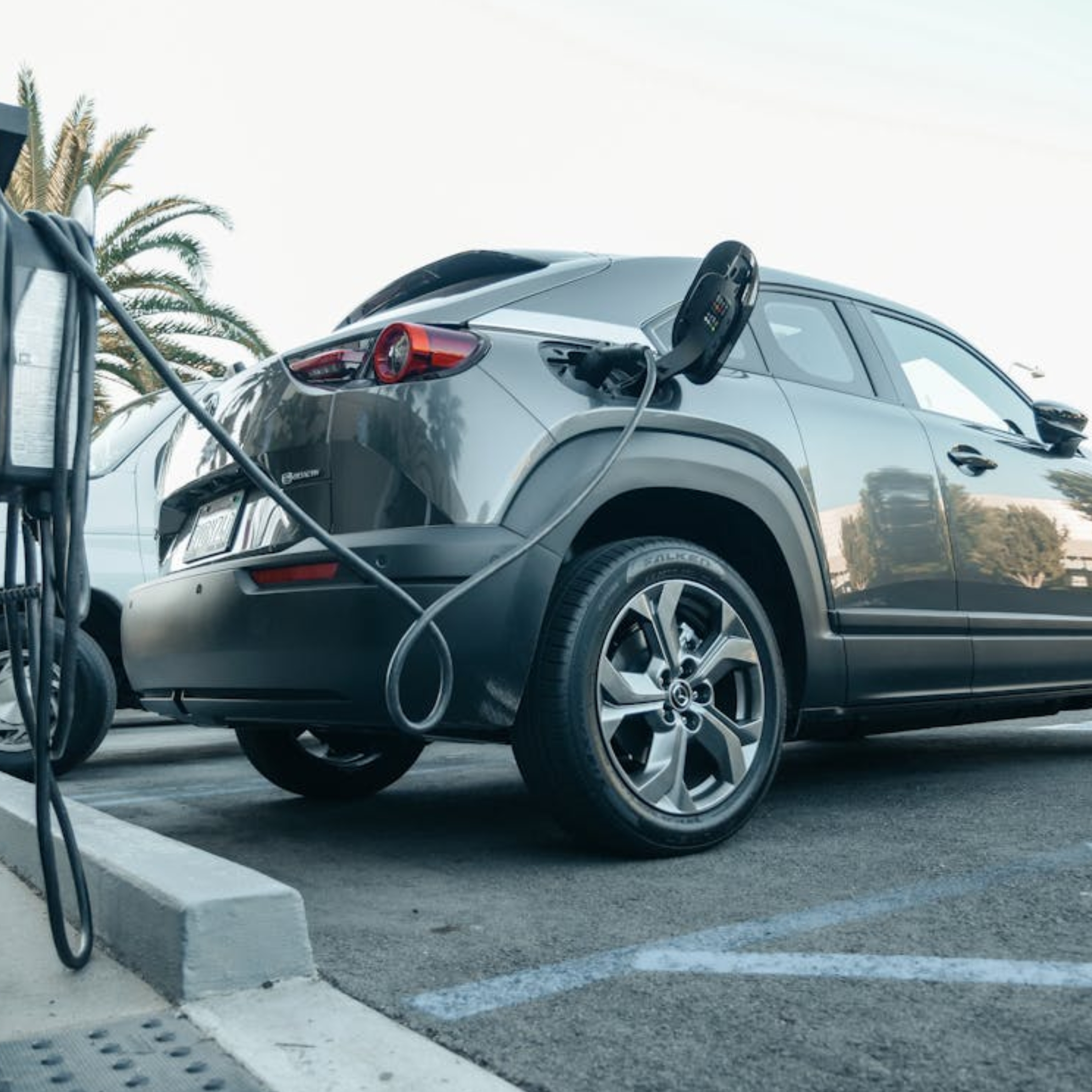 Gray Electric Car Parked on a Charging Bay